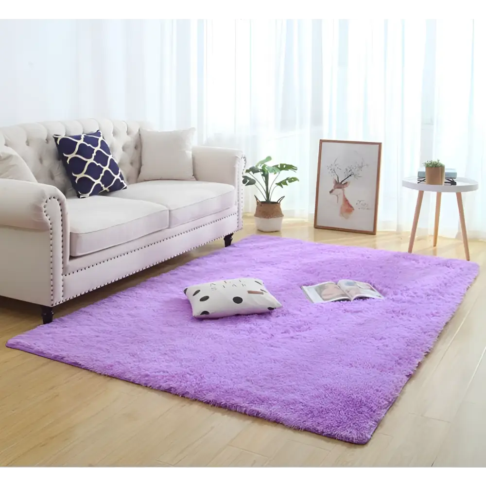 A gray silky fluffy carpet modern home decor shaggy rug with soft plush texture on wooden floor