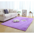 A plush vibrant purple shaggy silky fluffy carpet modern home decor rug with soft texture for stylish interiors