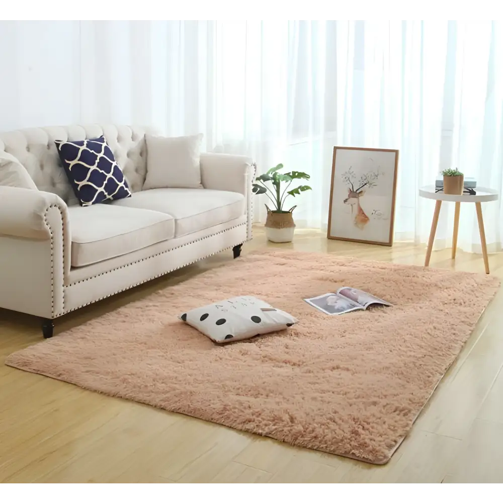 A plush peach-colored shaggy area rug with soft texture perfect as a silky fluffy carpet for carpet modern home decor