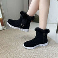 Black suede ankle snow boots winter warm with fluffy faux fur trim and white rubber soles for cold weather use
