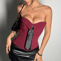 A structured burgundy corset with black satin tie front resembling a gray suede y2k bandeau design ins fashion piece