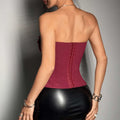 A structured burgundy corset with central lacing and smooth fabric paired with a gray suede y2k bandeau design ins fashion