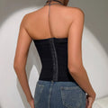 Black corset with central zipper and subtle embellishments along seam paired with gray suede y2k bandeau design ins fashion