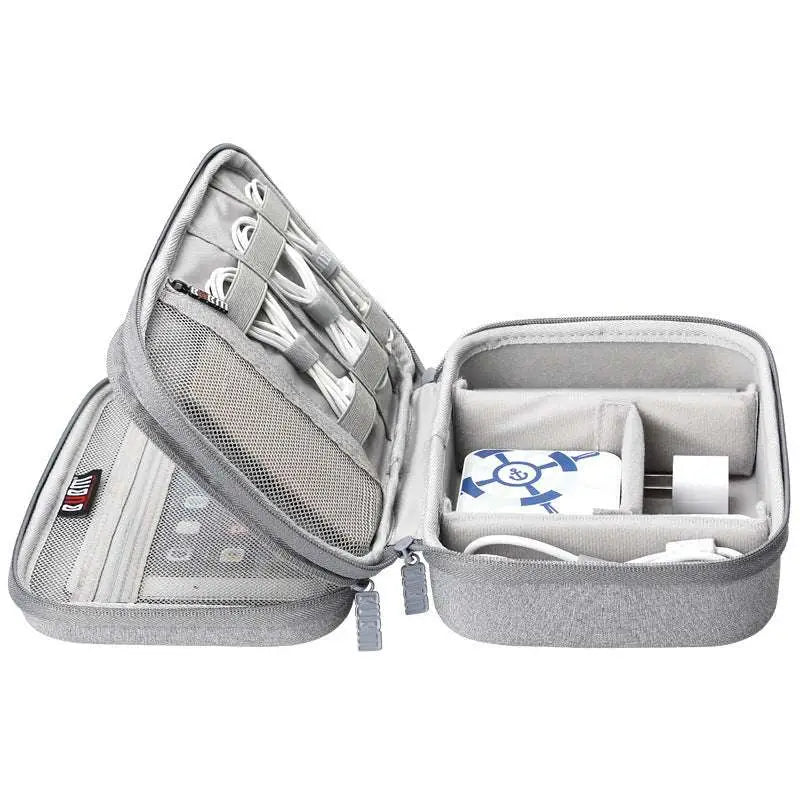 Gray textured fabric digital storage bag travel organizer with mesh compartments and zippered closure for electronics