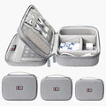 Gray textured fabric digital storage bag travel organizer with mesh and padded compartments for electronics