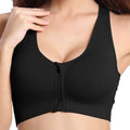 Black seamless zipper sports bra with front zipper closure and racerback straps for active wear