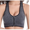 Gray textured zipper sports bra in heathered fabric with a front zipper closure for athletic use