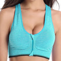 Turquoise zipper sports bra with black trim and front zipper closure featured with gray textured fabric details