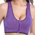 Purple heathered zipper sports bra with black trim and front zipper featured in gray textured style product listing