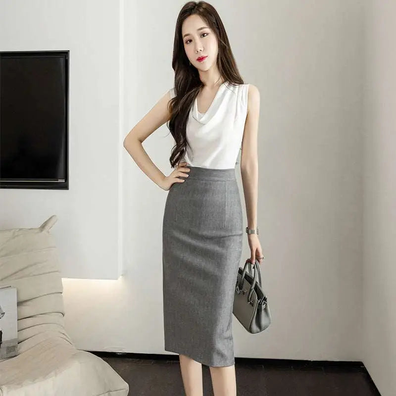 Gray textured line sheath skirt with subtle texture and elegant tight fit for a refined professional look