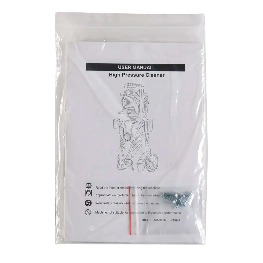 White user manual sealed in plastic with safety instructions and screws for green and black high pressure cleaner with coiled hose