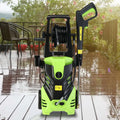 Green and black high pressure cleaner with coiled hose mounted for efficient cleaning and durability