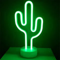 A green christmas tree led neon light with base featuring a glowing cactus lamp for perfect ambiance and minimalist design