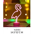 A glowing pink neon flamingo led neon light with circular base creating perfect ambiance against bokeh background