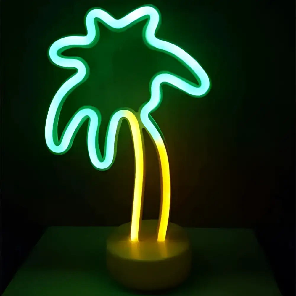 A green christmas tree led neon lights lamp with gradient green to yellow glow on a wooden base for perfect ambiance