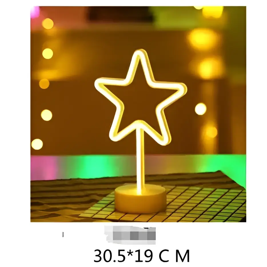 A glowing neon star-shaped led neon light with warm yellow light on a wooden base creating perfect ambiance