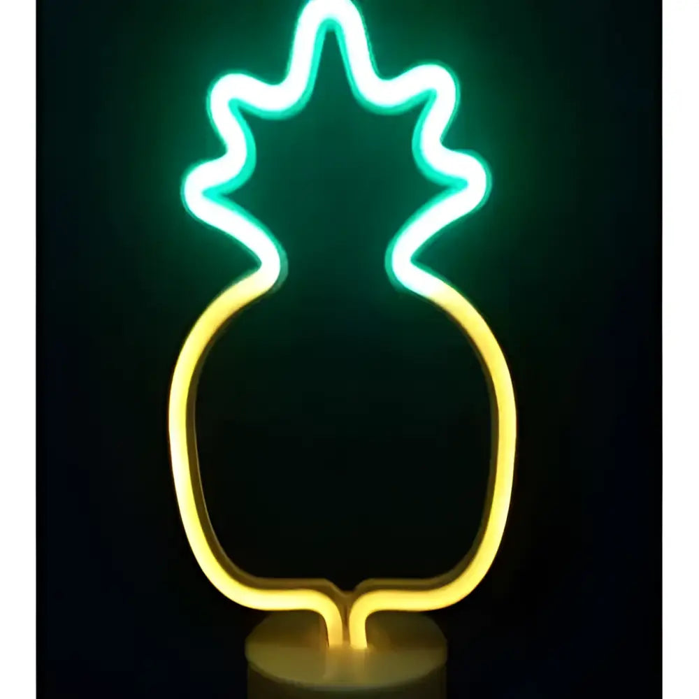 A glowing neon pineapple lamp led neon lights with green christmas tree colors creating perfect ambiance