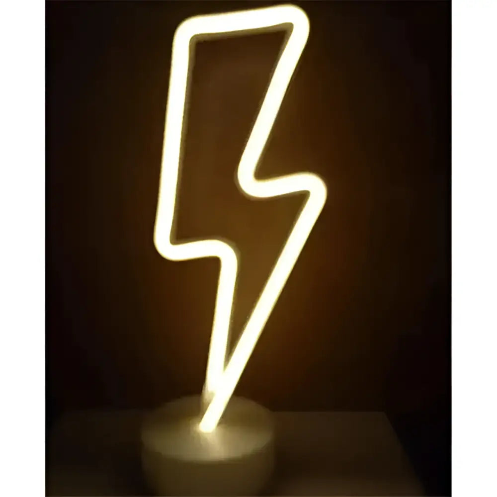 A glowing white neon lightning bolt lamp with led neon lights creating the perfect ambiance for green christmas tree decor