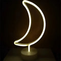 A glowing white neon crescent moon lamp with a sleek circular base creating the perfect ambiance with led neon lights