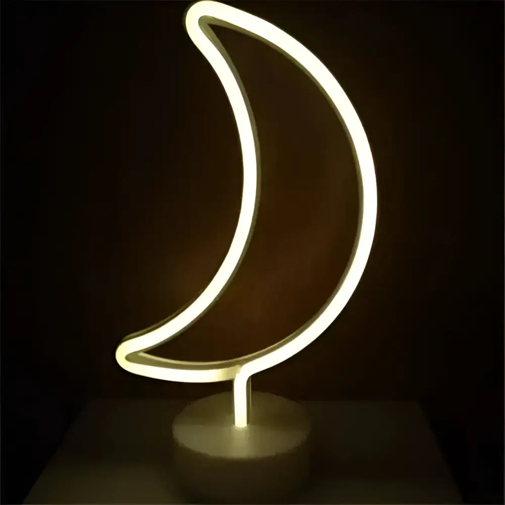 A glowing white neon crescent moon lamp with a sleek circular base creating the perfect ambiance with led neon lights