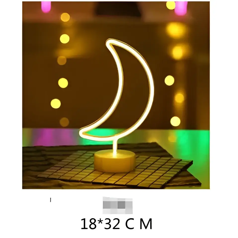 A glowing white neon crescent moon lamp with a cylindrical base creating perfect ambiance with led neon lights