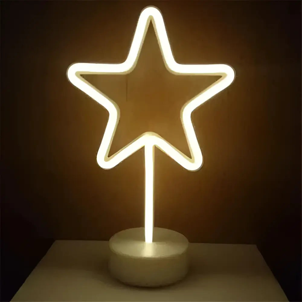 A glowing white led neon lights star-shaped lamp with slender stem and base creating perfect ambiance
