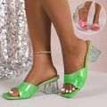 Green croc-embossed mule sandals with transparent geometric block heels perfect for slides slippers summer wear