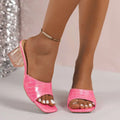 Pink croc-embossed mule sandals with transparent block heels ideal for slides slippers summer fashion trends