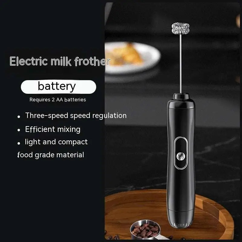 Black handheld battery version milk frother with sleek ergonomic design and ornate silver whisk head for frothing milk