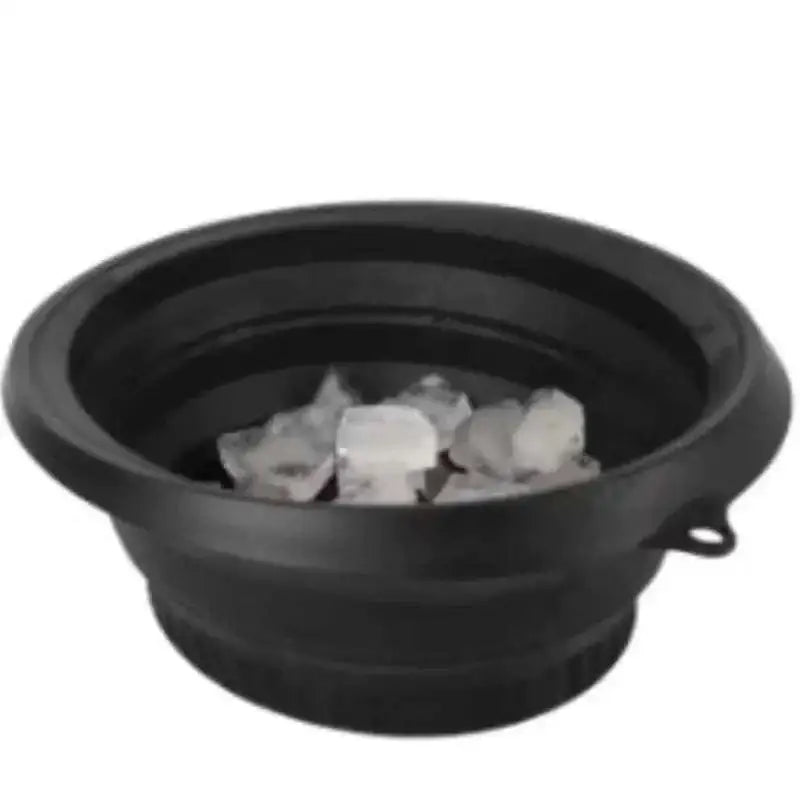 Black collapsible silicone ice basin with clear ice cubes inside from green honeycomb collapsible silicone ice collection
