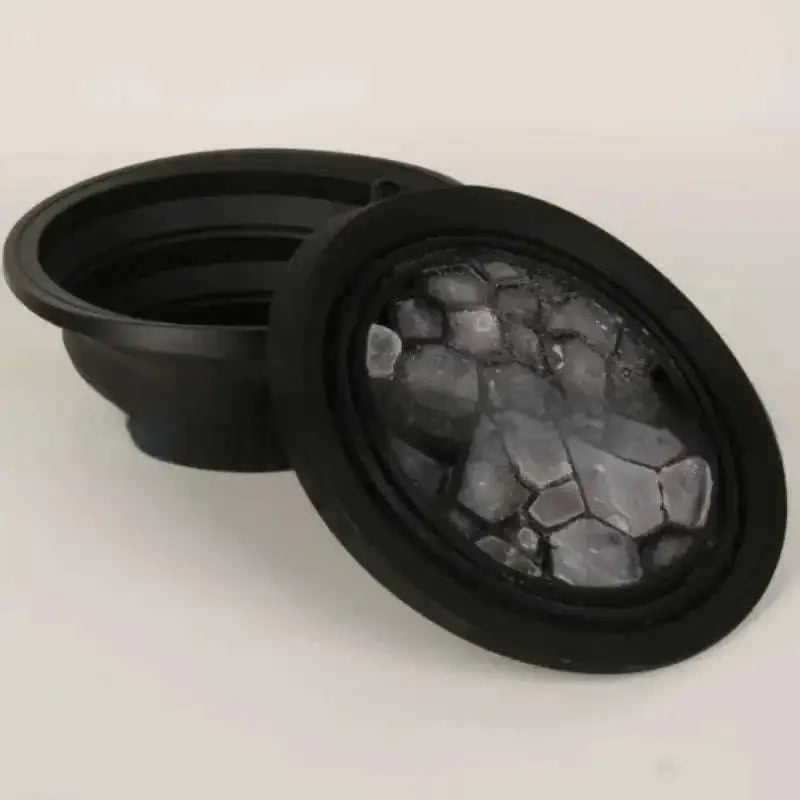 Light green honeycomb collapsible silicone ice basin with small side hole and honeycomb pattern design