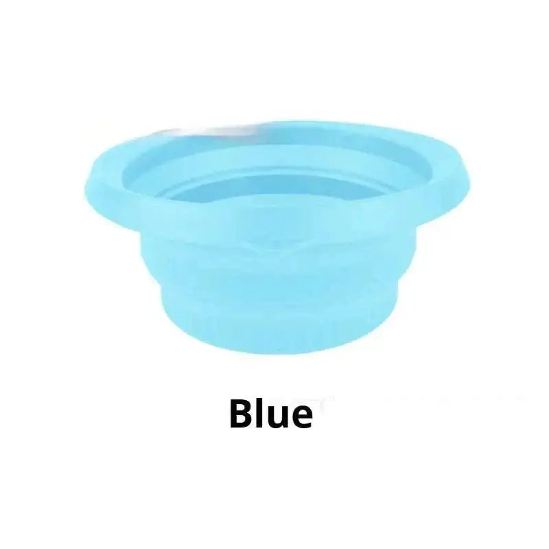 A light blue collapsible silicone ice basin with ribbed texture and flexible foldable design for easy storage