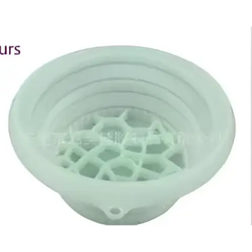 Light green honeycomb collapsible silicone ice basin with small side hole and honeycomb pattern design