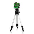Green laser line level kit with black and green laser mounted on silver tripod with black feet for precise leveling
