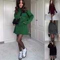 Green long sleeve knit casual sweater skirt set featuring an oversized sweater dress with flared skirt and ribbed cuffs