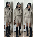 Green long sleeve knit casual sweater skirt sets featuring a cozy heathered taupe knit with ribbed cuffs