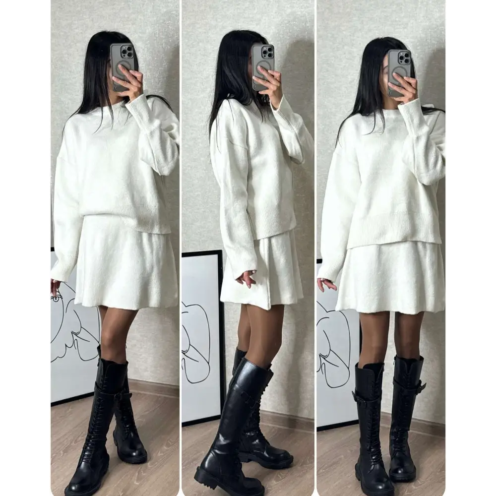 White oversized knit sweater dress with ribbed hem and cuffs paired with black combat boots in green long sleeve sweater skirt sets
