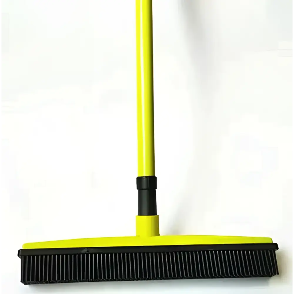 Bright yellow hair removal broom with black rubber blade and bristles for pet hair removal and washable mop head use