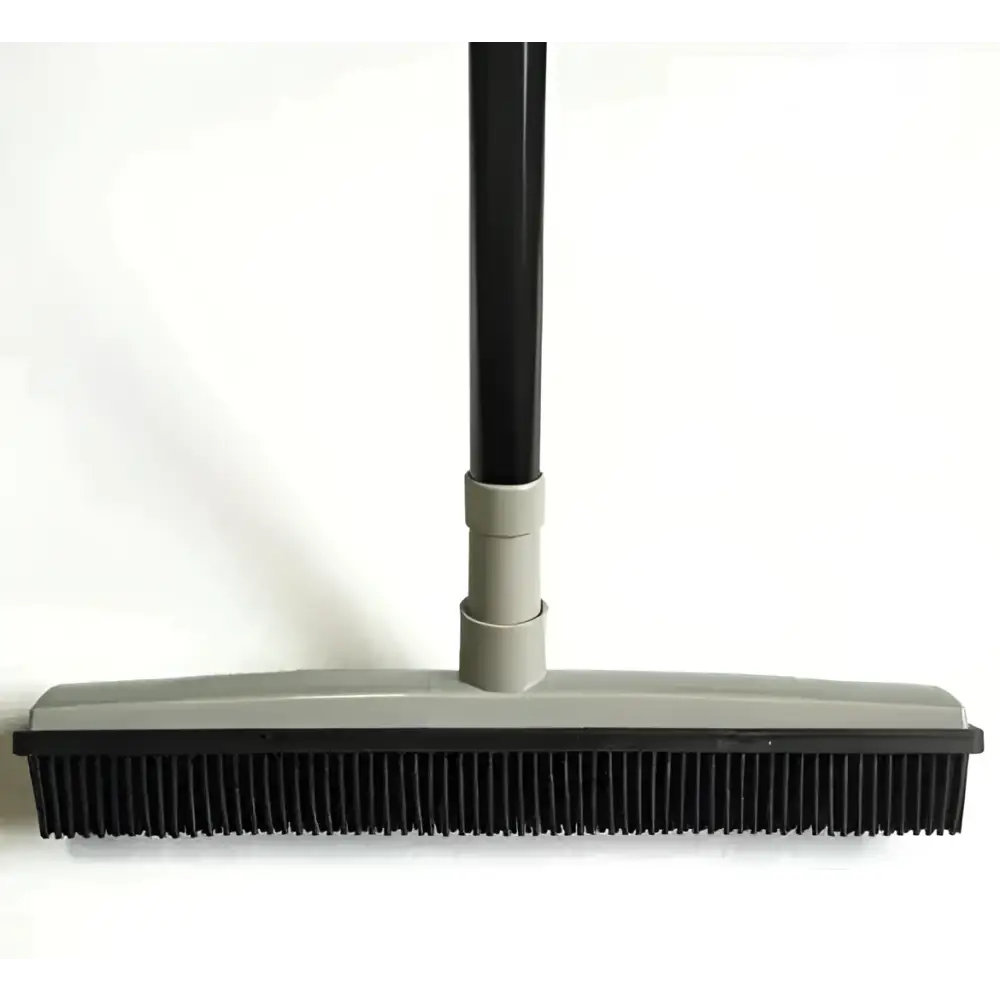 Black bristle hair removal broom with gray plastic handle and black grip for effective pet hair removal