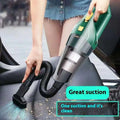 Green and black small wireless car vacuum cleaner with flexible hose for household and vehicle cleaning tasks