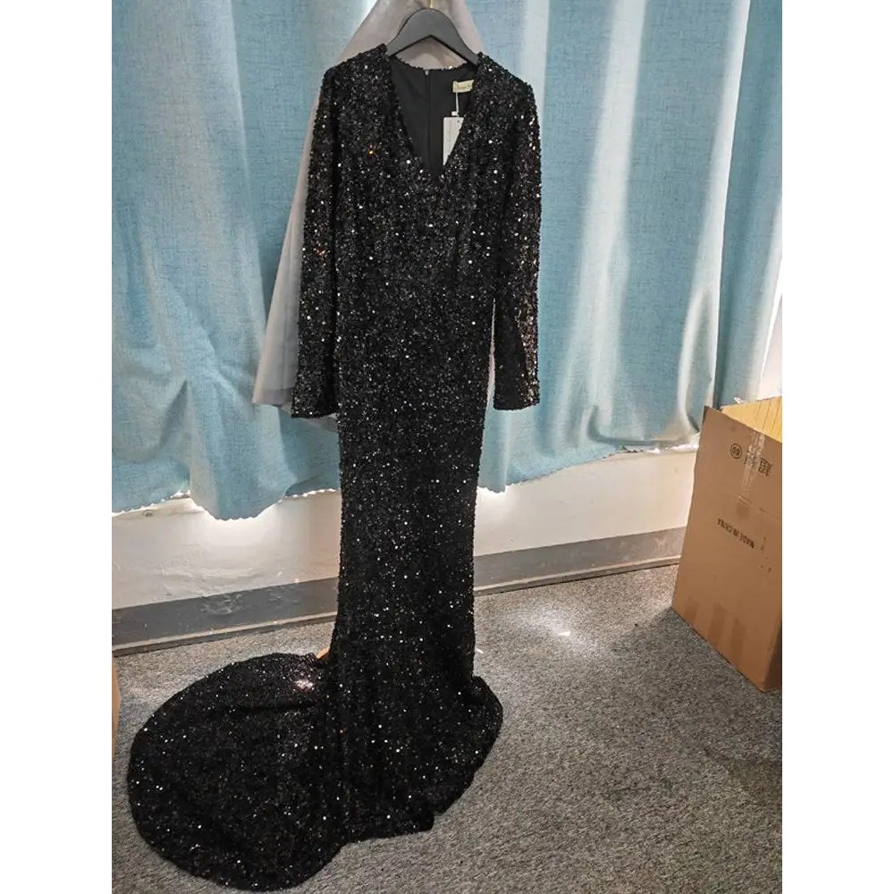 Silver and black long sleeve sequin mermaid evening dress with deep v neckline for formal occasions