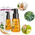 Golden amber moroccan hair care essential oil in a transparent glass bottle with black pump dispenser and matching cap