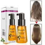 Golden-hued moroccan hair care essential oil in sleek black pump bottle with white box featuring purple accents and claims