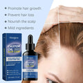 Black glass bottle with dropper and blue hoegoa label castor oil hair care solution improves hair smoothness next to box