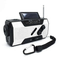 Black and white crank solar emergency radio with built-in flashlight antenna and carrying strap for outdoor use