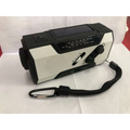 Black and white crank solar emergency radio with perforated panel, two rotary knobs, fm/am dial, and carrying strap