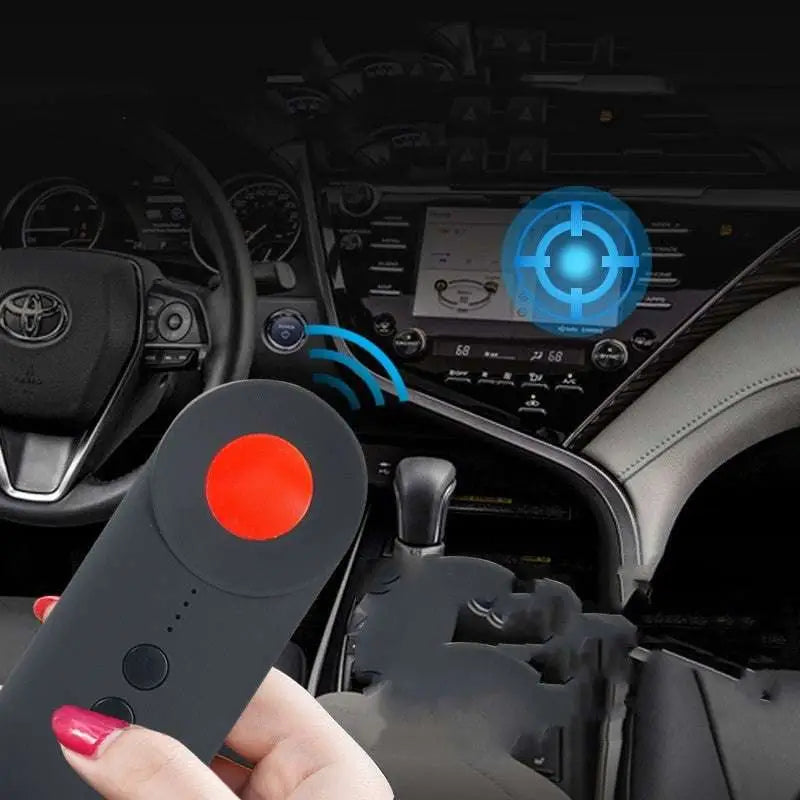 Black handheld positioning gps detector with red circular button and smaller black buttons for signal detection