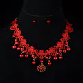 Handmade cloth wedding pearl necklace set featuring red lace choker with dangling red pearls and central pendant