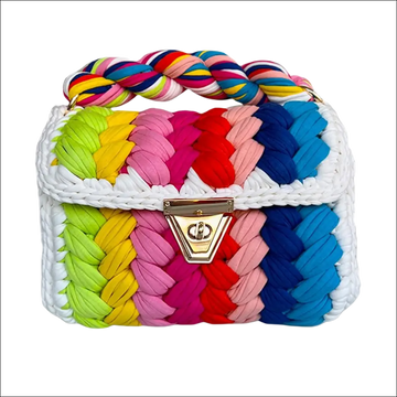 Handmade crocheted bag with colorful braided strap and multicolored fabric strips for wedding party events