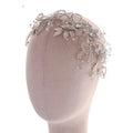 Handmade environmentally friendly silver floral headpiece with intricate lace delicate leaf motifs and sparkling crystals